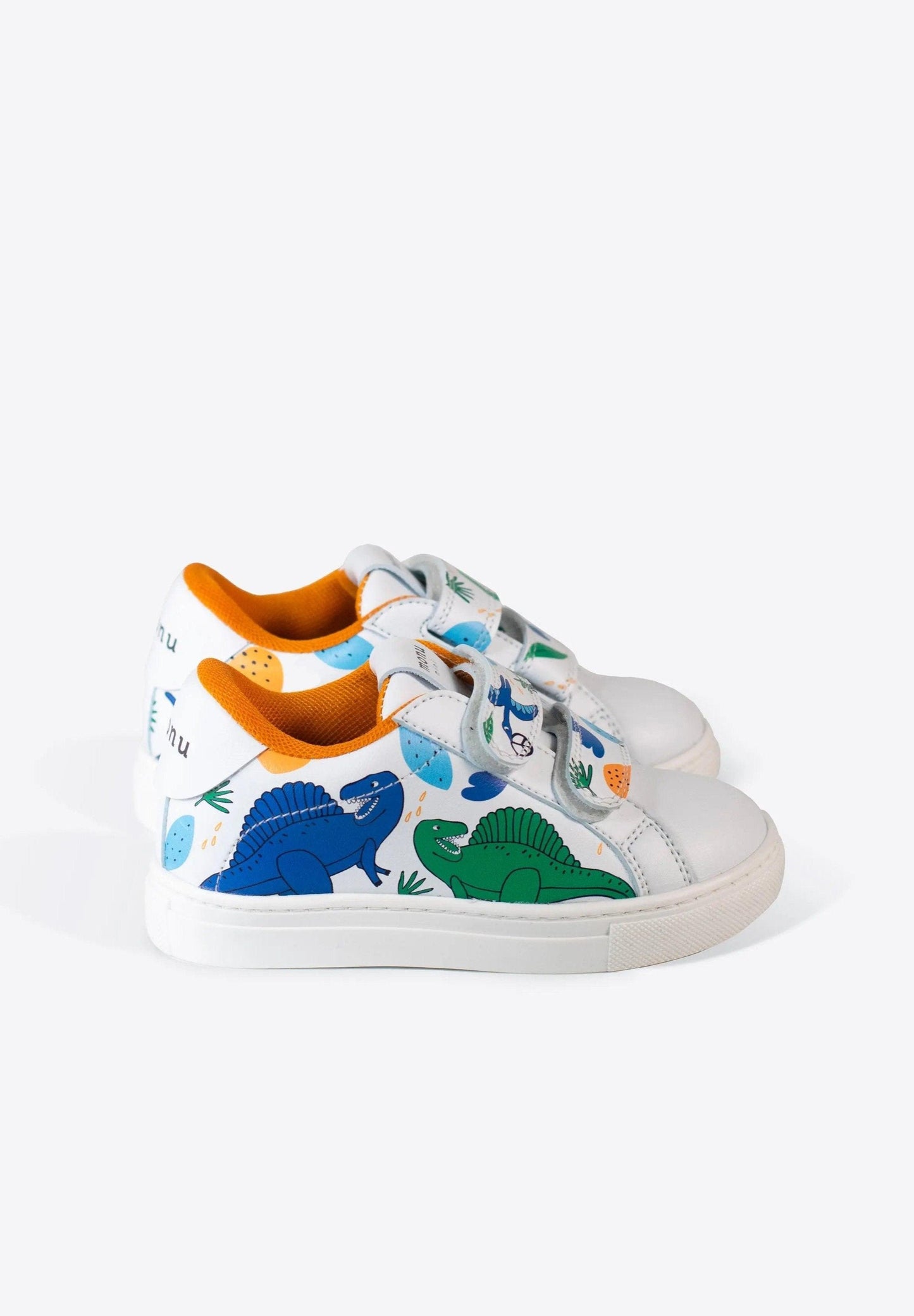 Tenis Dino Rugido de Monu Mini - Estampado de dinosaurios enérgico y colores vibrantes. Foto lateral.