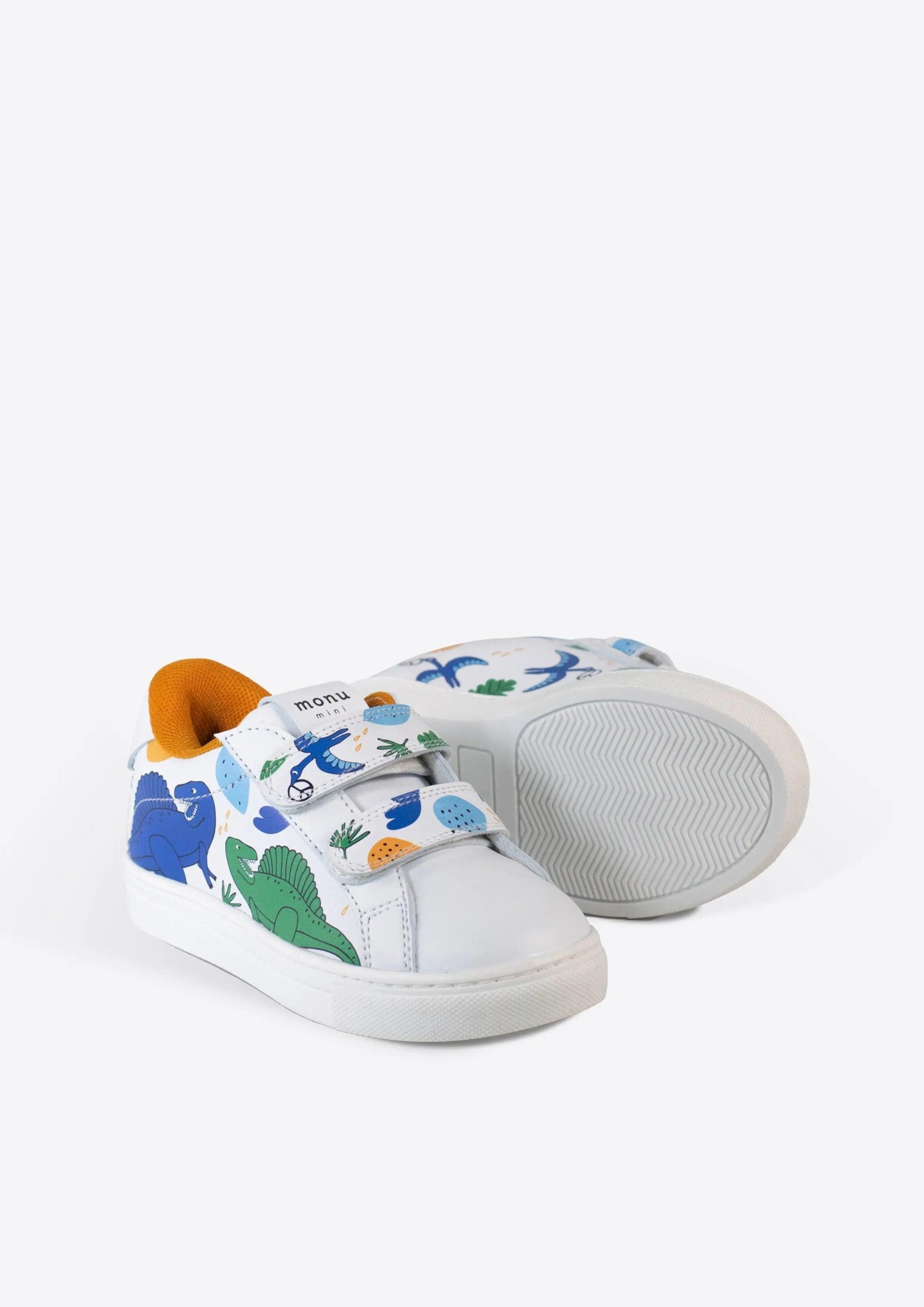 Tenis Dino Rugido de Monu Mini - Estampado de dinosaurios enérgico y colores vibrantes. Foto lateral y suela.